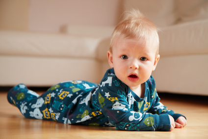 baby crawling on a floor